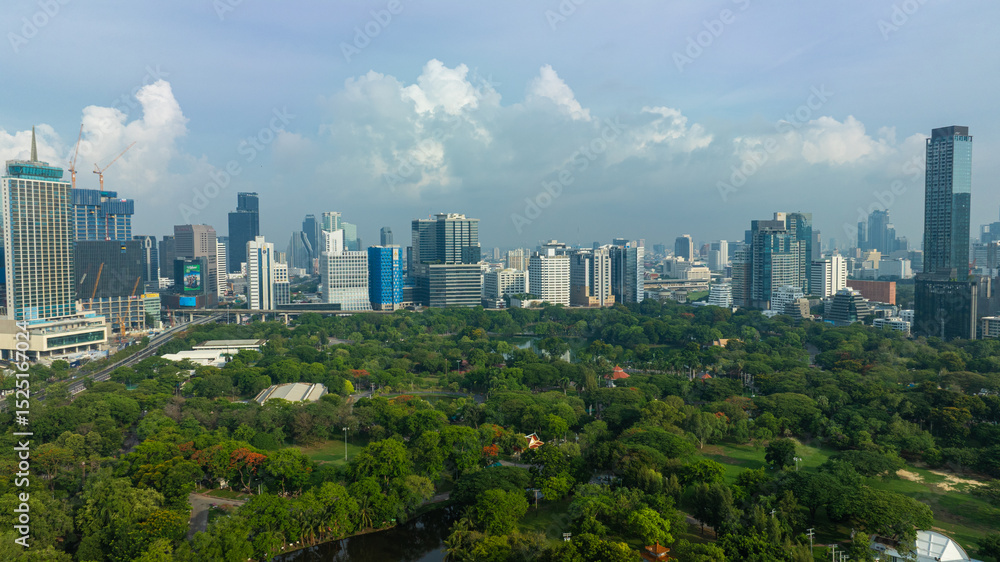 Fototapeta premium Aerial view city park metropolis office building Lumpini public park central