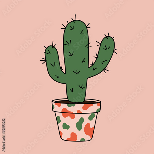 Cute potted cactus plant with green stems and spines in stylish terracotta pot.  Home decor cactus in trendy pot with abstract pattern perfect for modern interior design.