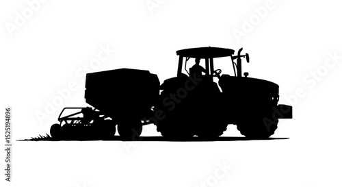 Tractor silhouette working in field during daylight hours  