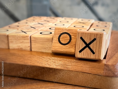 Closed up O X wooden blocks , Tic Tac Toe game. 