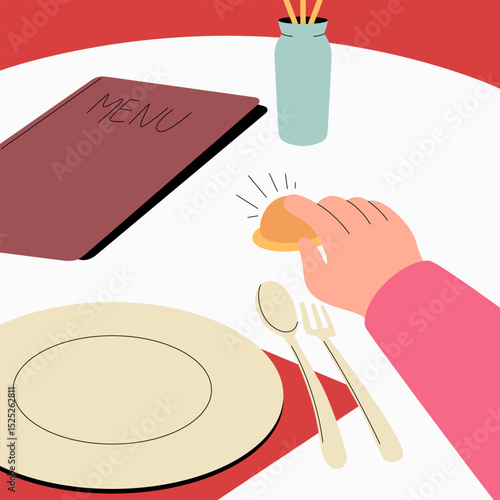 A hand pressing the service bell on a restaurant table to place an order