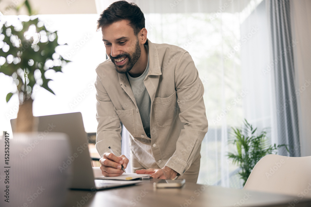 Obraz premium Man Working From Home
