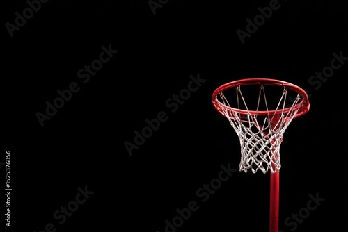 A Red Netball Hoop Under The Bright Lights