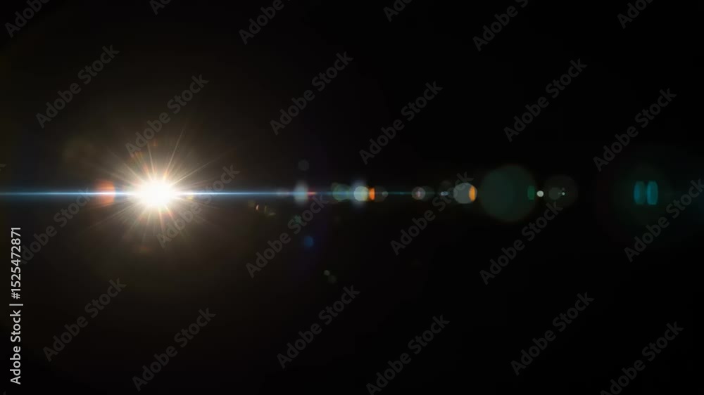 Abstract video of a bright light with lens flare effect on black background overlay