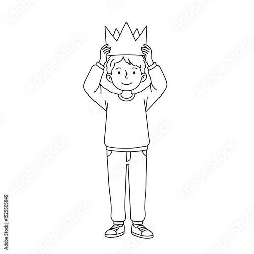 schoolboy wearing a crown happily standing and celebrating