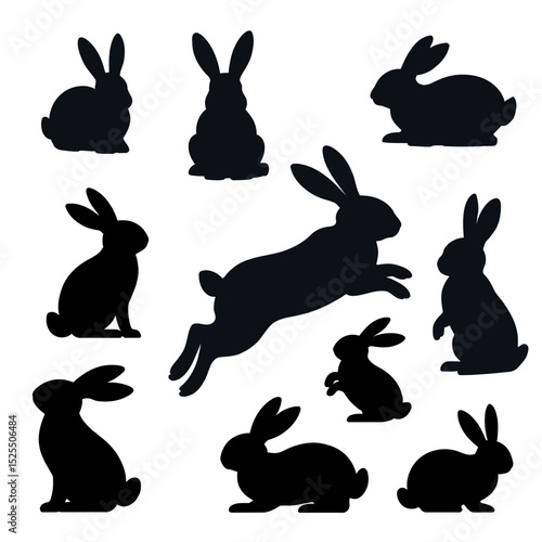 Silhouette collection of rabbits in various poses including sitting jumping and standing