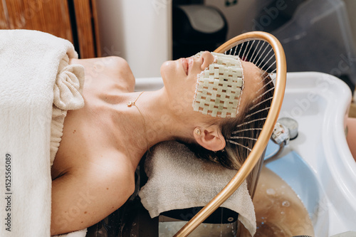 Scalp treatment spa using circulating shower water system for professional head wash therapy.