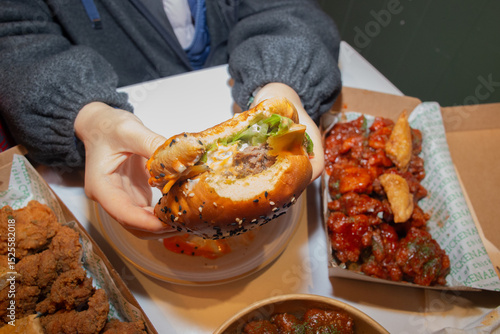 Korean deep dried chicken with sweet buns and spicy sauce.