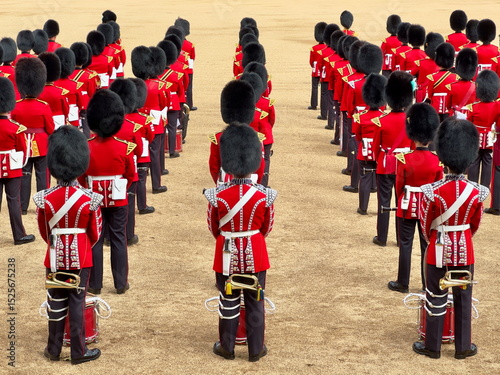 trooping the colour king's guards drummers and bugle  on parade in traditional red army uniform and bear hats