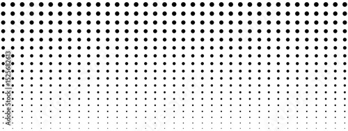 Dotted pattern. Background with halftone gradient effect. Abstract geometric print with different sized round shapes. Perforated texture. Wallpaper with holes. Vector graphic illustration.