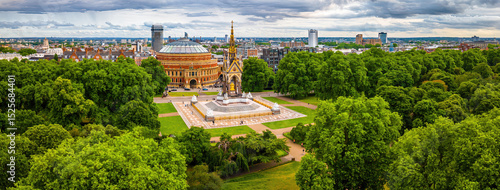 Aerial view of the Royal Albert Hall in London, surrounded by classic red-brick buildings, roads, and green trees