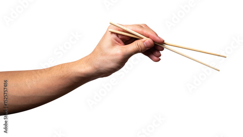 Male hand holding a wood chopstick isolated on white background.