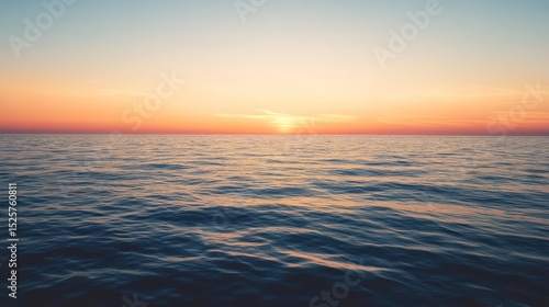 Peaceful ocean horizon with vibrant colors at sunset creating serene scenery