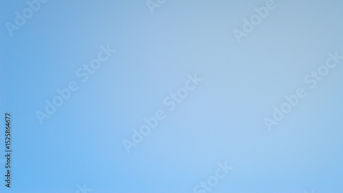 Soft blurred blue gradient screen background with a smooth transition from light to dark tones. Ideal for use in graphic design, branding, presentations, digital overlays, and creative projects
