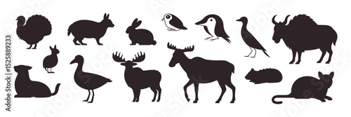 Wild animals of tundra and taiga fauna vector set with arctic hairy animals and bird silhouettes

