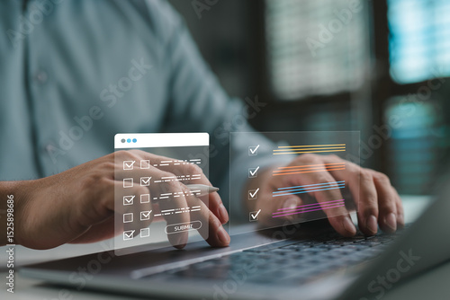 Fototapeta Online survey and evaluation form, Person completing digital checklist and assessment form on laptop