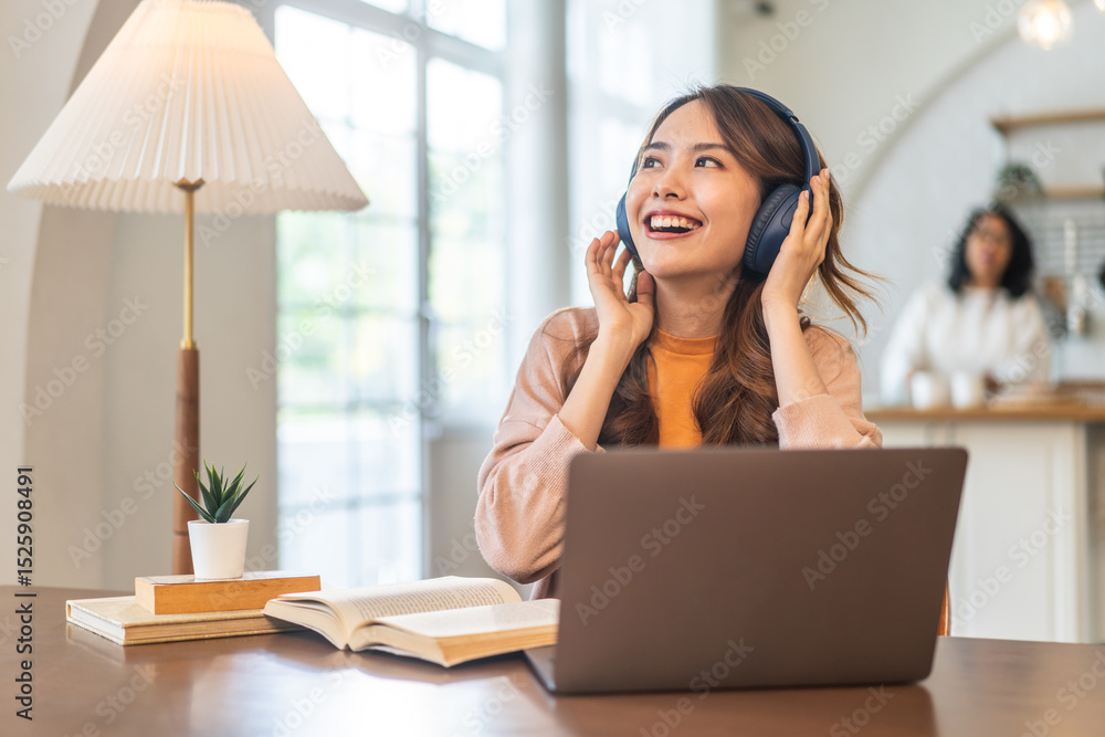 Young smiling asian woman happy relax use laptop conference work,learning, education, shopping, study online, webinar, online marketing, business, blog, digital internet advertising at home Young smiling asian woman happy relax use laptop conference work,learning, education, shopping, study online, webinar, online marketing, business, blog, digital internet advertising at home