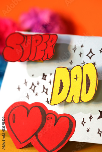 Beautiful, handmade card for dad for Father's Day. Children's creation of a card. Ideas of how it could look. Cute heart on the envelope. Gift for the best dad in the world.