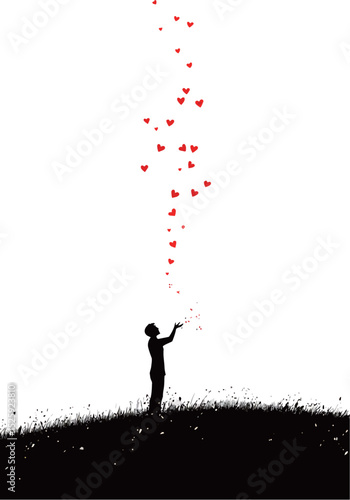 Silhouette of a child releasing hearts into the air, symbolizing love and hope.