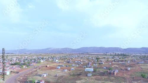 Wallpaper Mural Scattered homes in Mall Of Africa township, Midrand with distant mountain views Torontodigital.ca