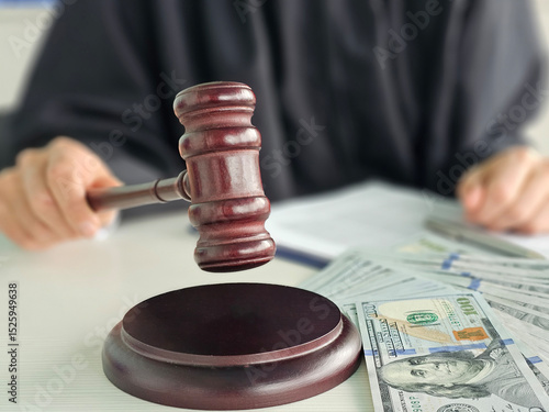 Obraz na plátně Court session highlights a judge in action with gavel cash, illustrating the leg