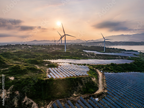 Solar photovoltaic windmill wind energy at sunset