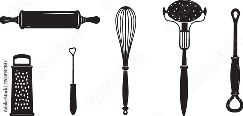 Set of isolated kitchen utensils including forks, spoons, and knives, featuring metal silverware and various cooking tools on a white background
