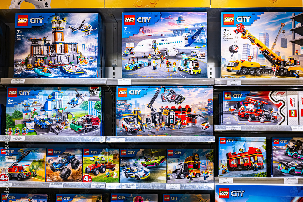 Obraz premium Sets of Lego construction toys displayed on store shelves