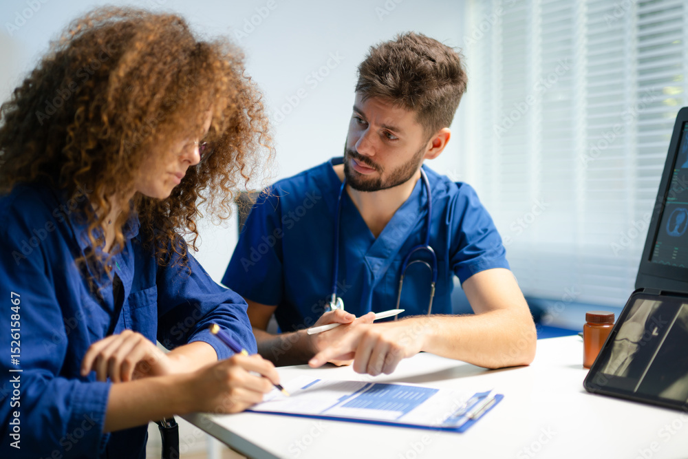 Naklejka premium Doctor guides female patient to complete medical registration form. Concept of healthcare paperwork, consent,