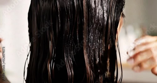 Luxurious Dark Hair Care Treatment Woman's Wet Wavy Hair Close Up Shot