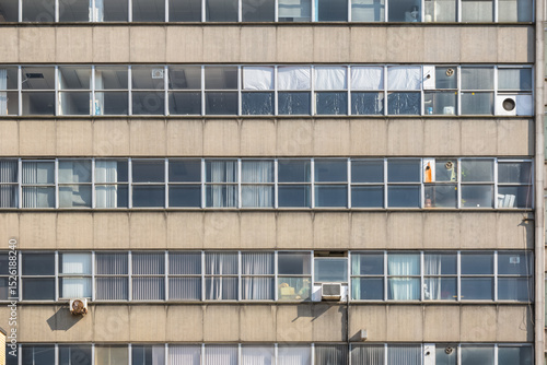 Facade of an old concrete office building in Battersea, southwest London, UK
