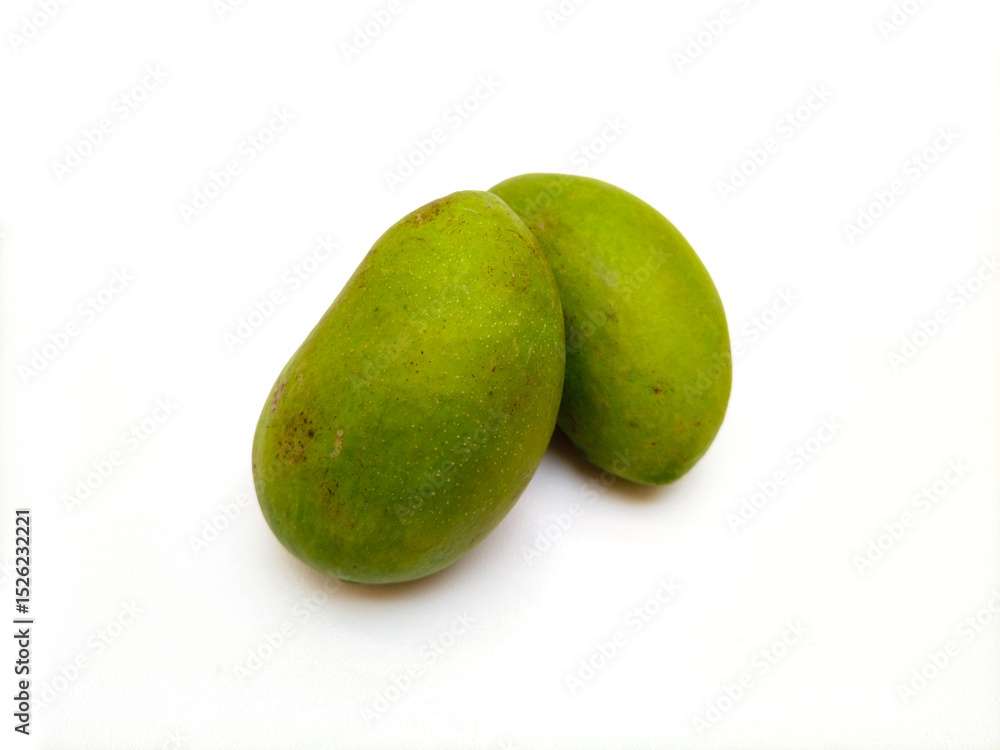 Fresh green mango fruit isolated on white background, tropical fruit, unripe mangoes for pickle Fresh green mango fruit isolated on white background, tropical fruit, unripe mangoes for pickle
