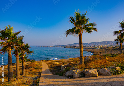 Summer morning at promenade near Mediterranean sea in village Chloraka in Cyprus