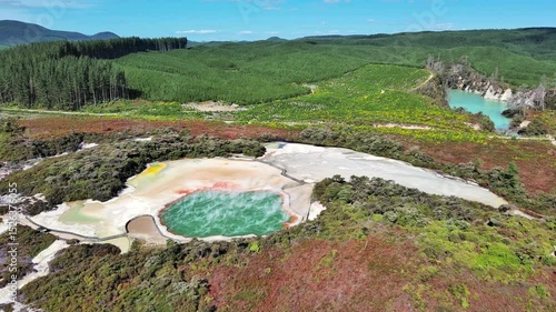 Waiotapu, Rotorua, New Zealand: Aerial view of famous active geothermal area, vibrant, colorful geothermal landscape with hot springs - landscape panorama of North Island from above
