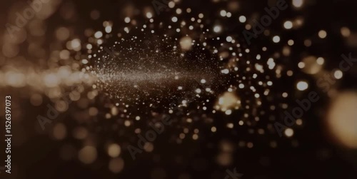 drops of water A seamless loop of abstract light particles moving gracefully through a dark, ethereal space. Soft, dreamy bokeh effect.
Ideal for background or overlay. 4K, slow motion, calming atmosp