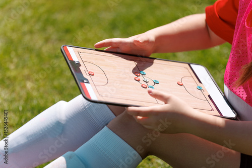 Konstfotografi Young Soccer Player Analyzing Game Strategy on Tactics Board During Outdoor Prac