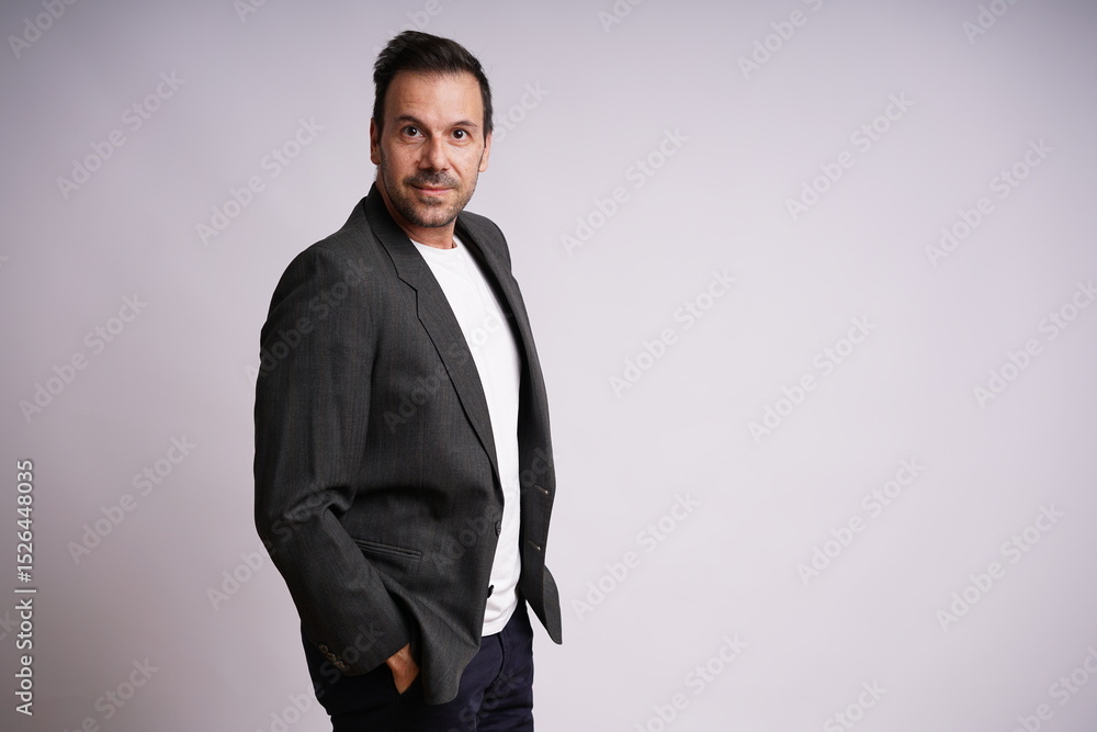Fototapeta premium Male Model Showing Different Emotions on White Studio Background