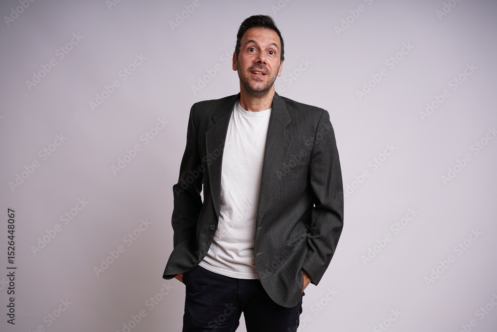 Fototapeta premium Male Model Showing Different Emotions on White Studio Background