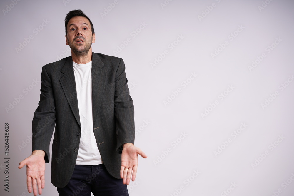 Male Model Showing Different Emotions on White Studio Background Male Model Showing Different Emotions on White Studio Background