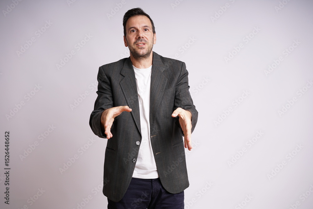 Male Model Showing Different Emotions on White Studio Background Male Model Showing Different Emotions on White Studio Background