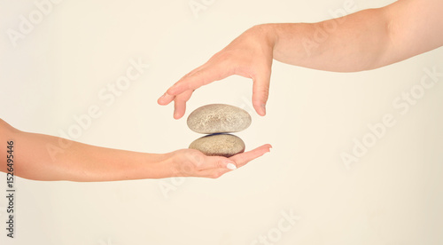 Photography hands holding zen stones for background