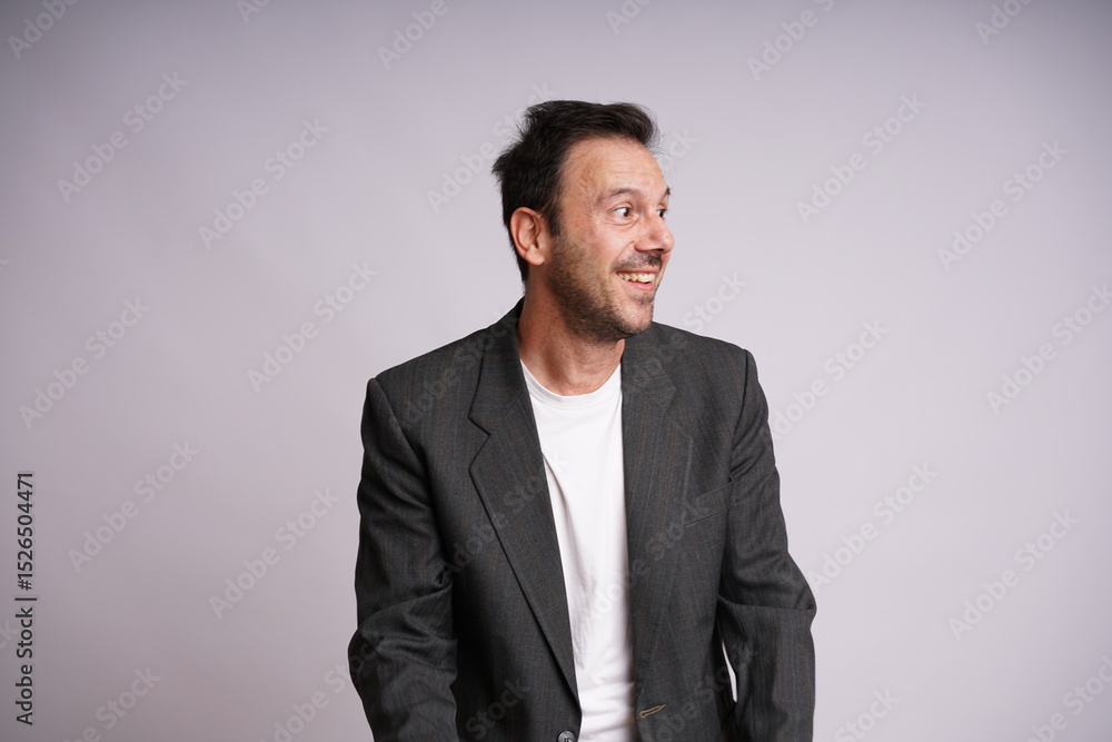 Male Model Showing Different Emotions on White Studio Background Male Model Showing Different Emotions on White Studio Background