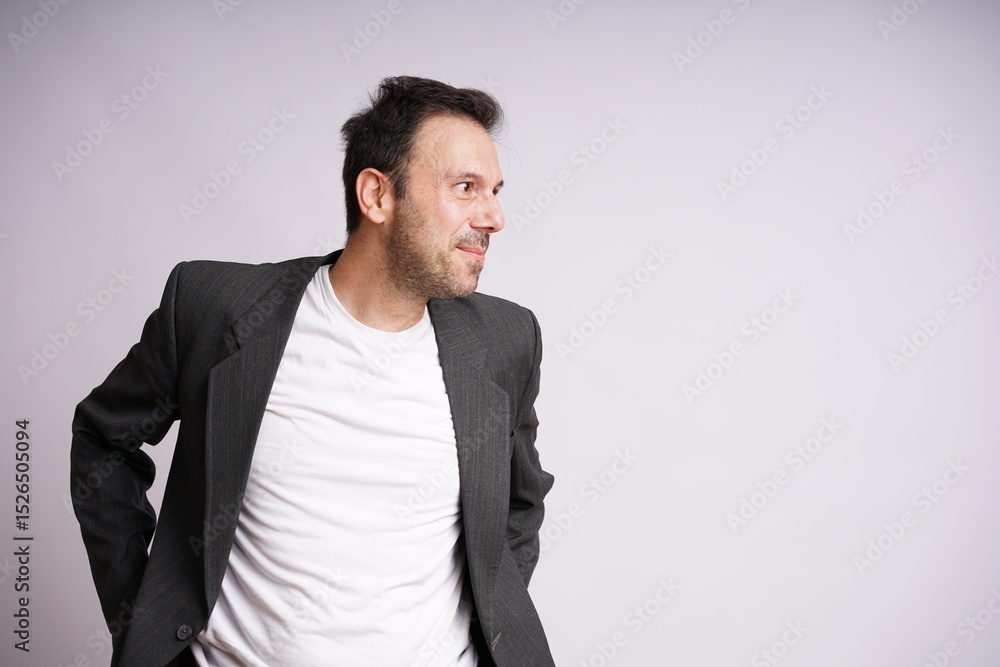 Male Model Showing Different Emotions on White Studio Background Male Model Showing Different Emotions on White Studio Background