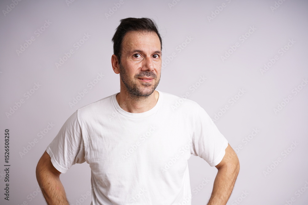 Obraz premium Male Model Showing Different Emotions on White Studio Background