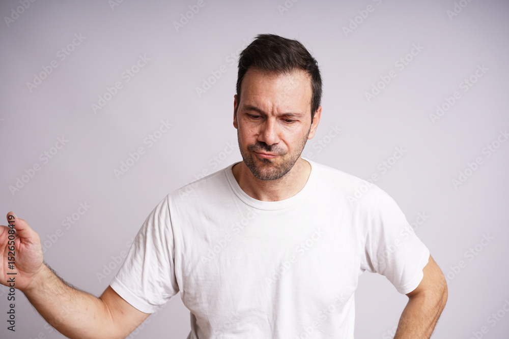 Male Model Showing Different Emotions on White Studio Background Male Model Showing Different Emotions on White Studio Background