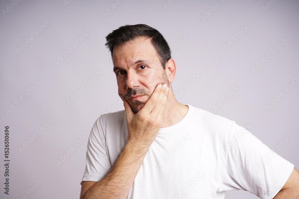 Male Model Showing Different Emotions on White Studio Background Male Model Showing Different Emotions on White Studio Background