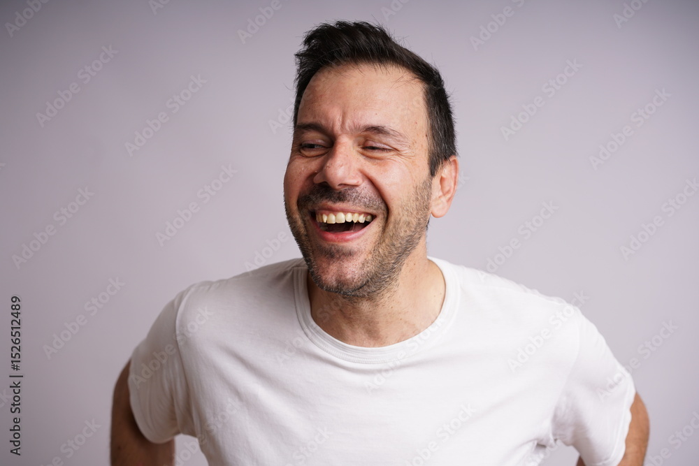 Obraz premium Male Model Showing Different Emotions on White Studio Background