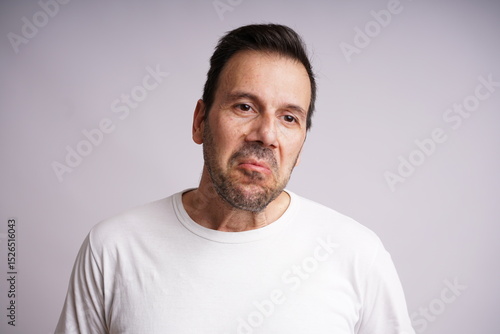 Male Model Showing Different Emotions on White Studio Background