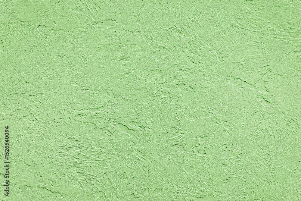 Obraz premium Beautiful uneven green texture. Neutral decorative background.