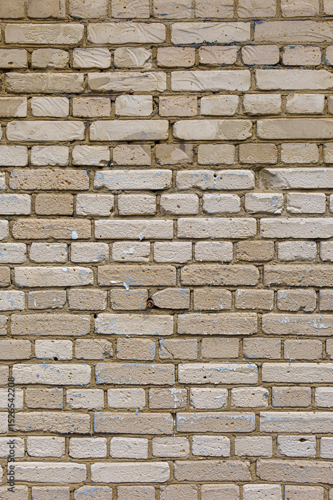 A boring wall of gray silicate bricks. Neutral building background of degradation. A boring wall of gray silicate bricks. Neutral building background of degradation.